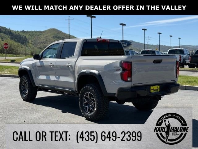 View vehicle photo 3