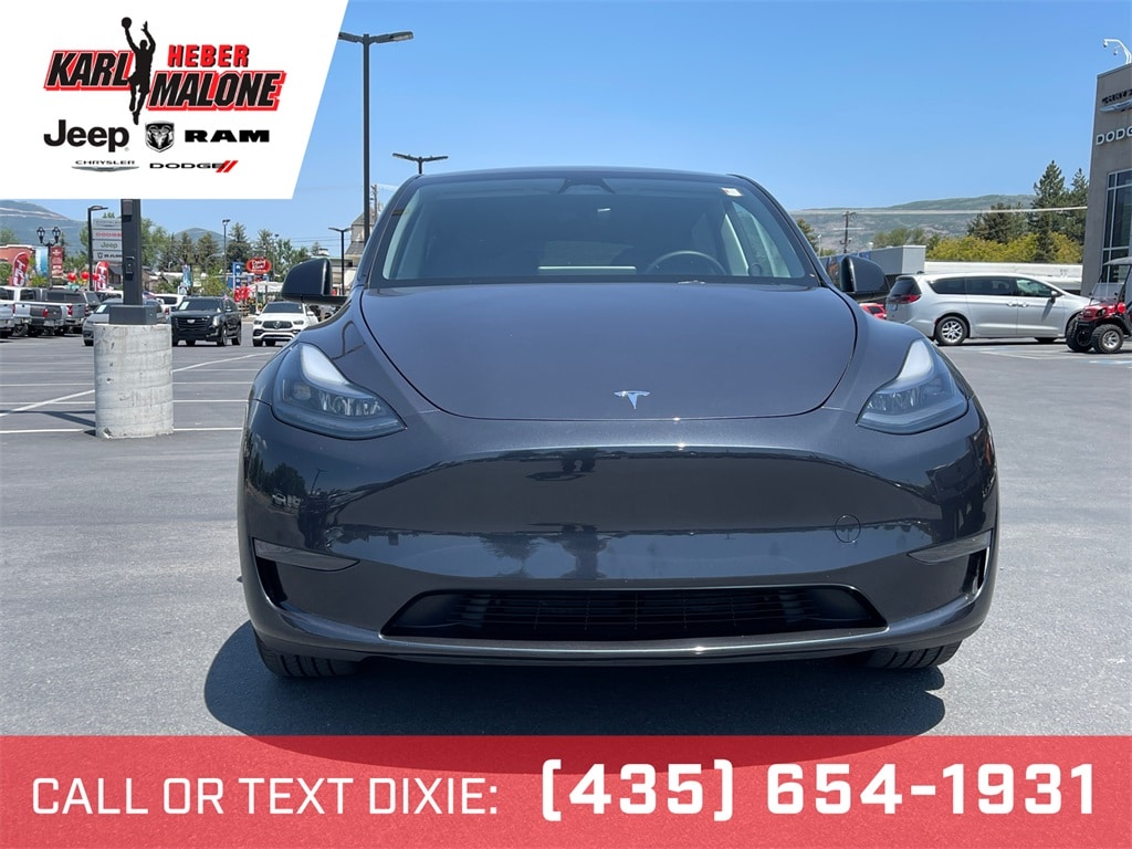 Used 2024 Tesla Model Y Long Range with VIN 7SAYGDED1RF097583 for sale in Northfield, Minnesota
