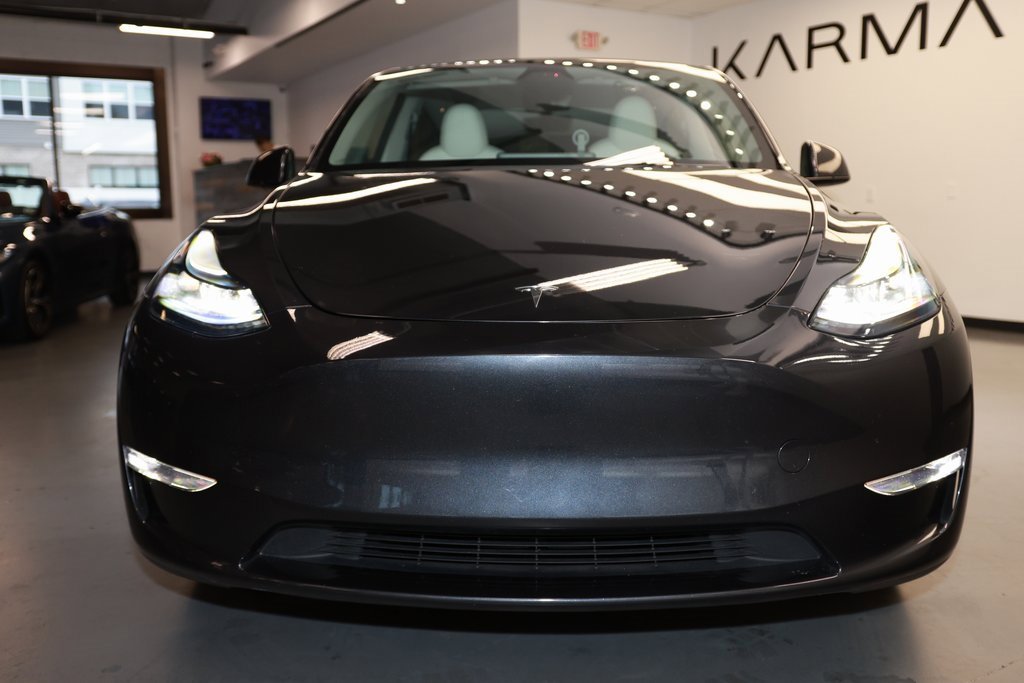 Used 2024 Tesla Model Y Long Range with VIN 7SAYGDEE9RA277612 for sale in Kansas City