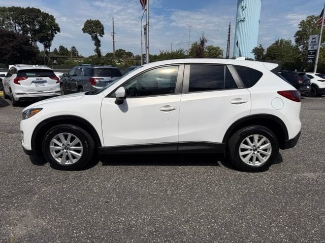 Used 2014 Mazda CX-5 Touring with VIN JM3KE4CY3E0331091 for sale in Rockville Centre, NY