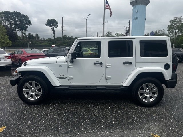 Used 2017 Jeep Wrangler Unlimited Sahara with VIN 1C4BJWEG9HL537376 for sale in Rockville Centre, NY