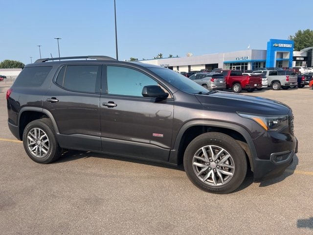 Used 2017 GMC Acadia SLE-2 with VIN 1GKKNTLS0HZ318818 for sale in Janesville, WI