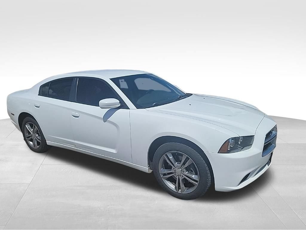 Used 2013 Dodge Charger SXT with VIN 2C3CDXJG0DH528679 for sale in Janesville, WI