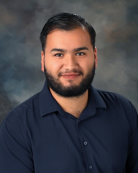 Staff member Manny Bran from 0571e13d3470