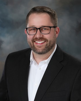 Staff member Brandon McNett from 0571e13d3470