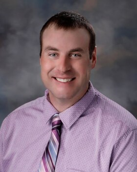 Staff member Dante Lewis from 0571e13d3470