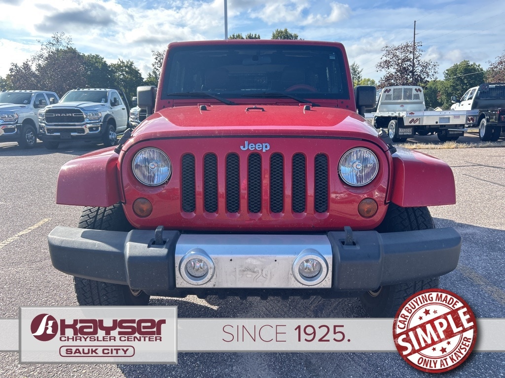 Used 2011 Jeep Wrangler Sahara with VIN 1J4AA5D14BL507223 for sale in Sauk City, WI