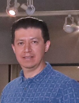 Staff member Efren Vinueza from 888c357229d4