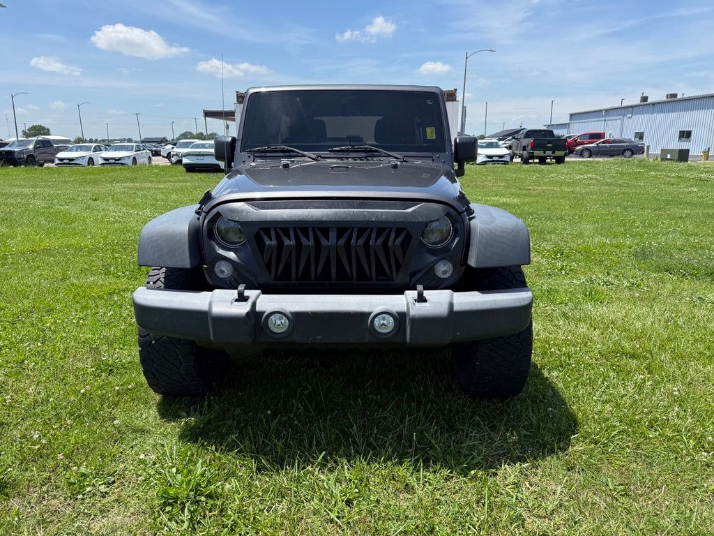 Used 2018 Jeep Wrangler JK Unlimited Sport S with VIN 1C4BJWDG6JL899348 for sale in Mattoon, IL