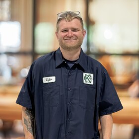 Staff member Tyler Large from ID_a90197