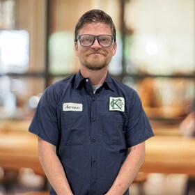 Staff member Aaron Caw from ID_a90197