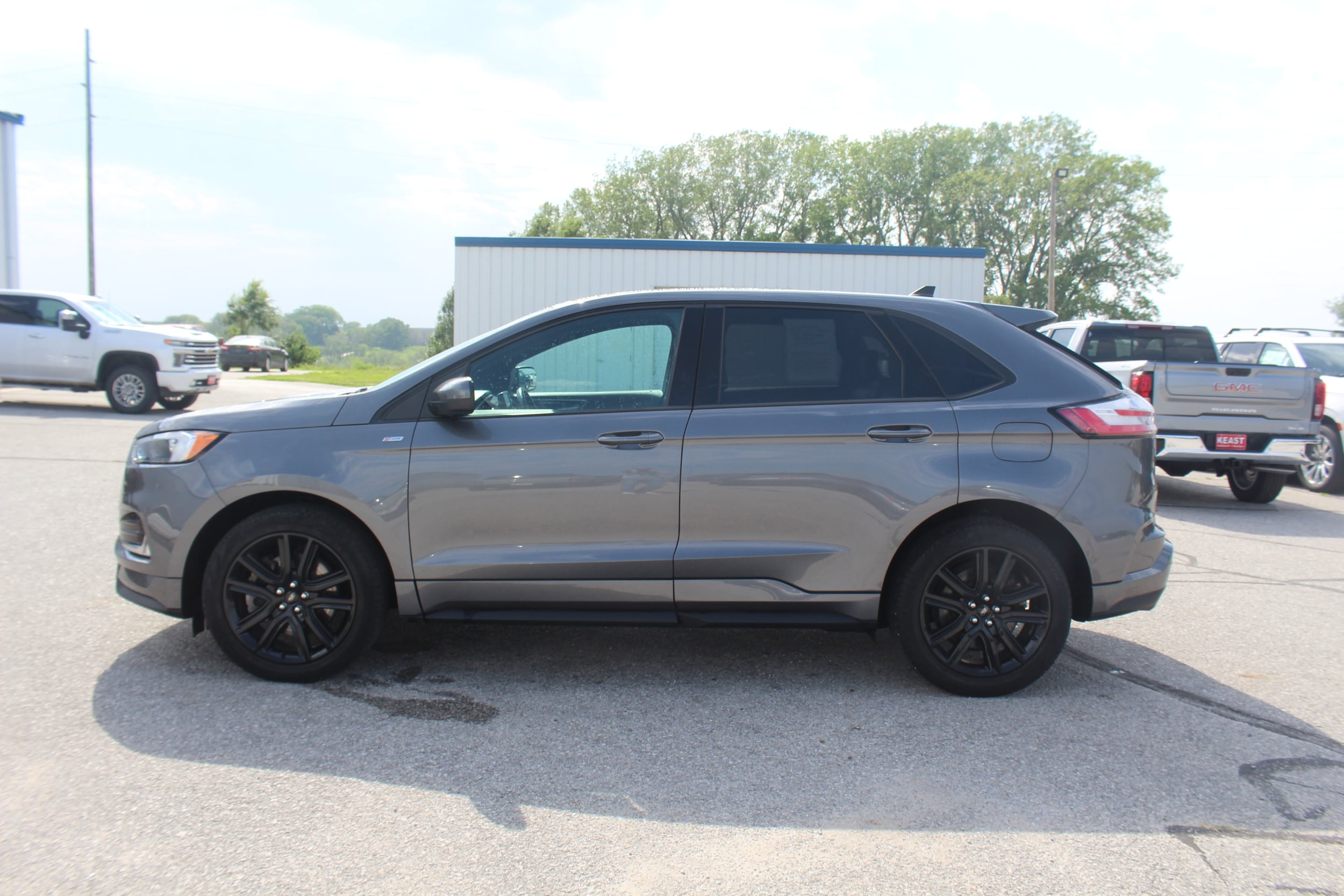 Used 2021 Ford Edge ST-Line with VIN 2FMPK4J96MBA10397 for sale in Harlan, IA