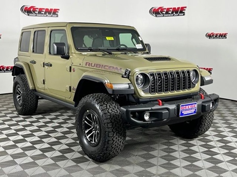 tan 2026 Jeep Wrangler SUV parked at theKeene CDJR dealership in Jarrettsville, MD