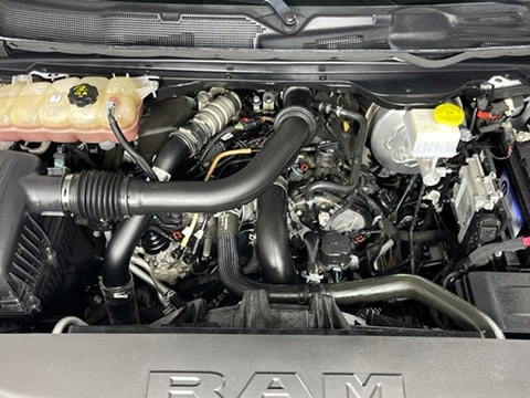 Engine bay of a 2022 RAM 1500 EcoDiesel parked at the Keene CDJR dealership in Jarrettsville, MD