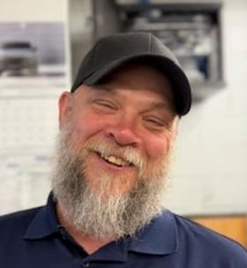 Staff member Chris Reinacher from 1ef17015dbac