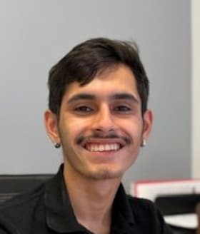 Staff member Yandel Villafane from ID_cacf5f
