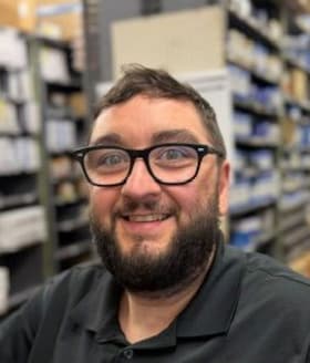 Staff member Adam LeGrand from 1ef17015dbac
