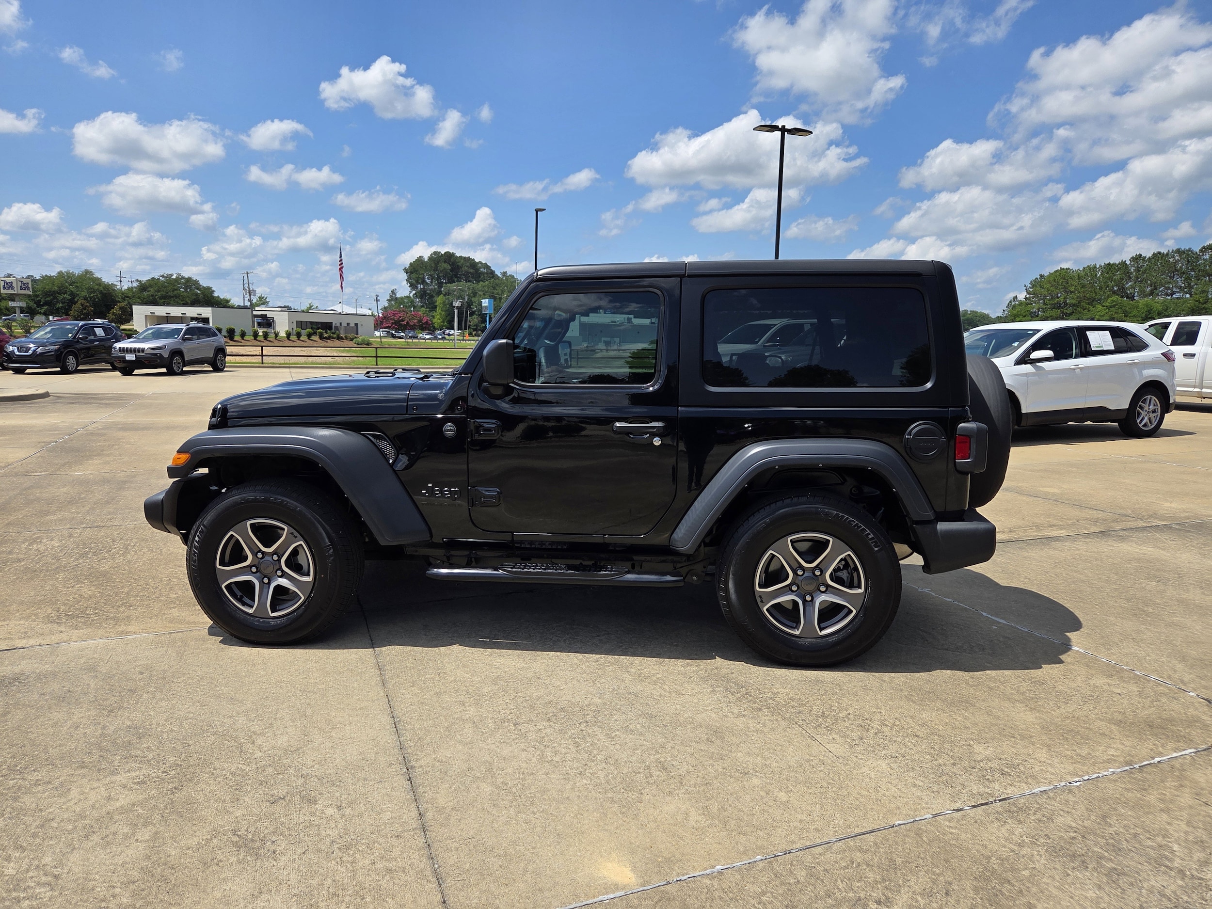 Used 2023 Jeep Wrangler 2-Door Sport S with VIN 1C4HJXAG2PW682097 for sale in Brookhaven, MS