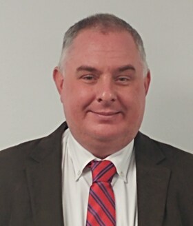 Staff member KEVIN MORAN from 8431f96a56a7