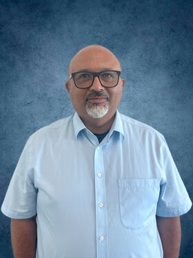 Staff member Juan Perez from ID_b004eb
