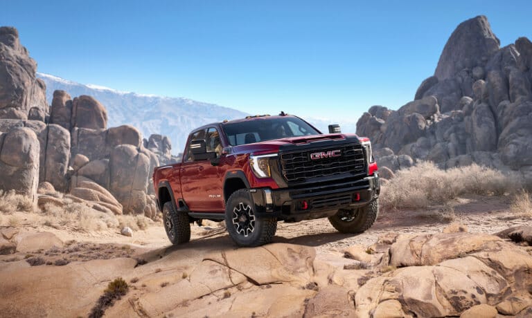 2025 GMC Sierra 2500 HD Exterior Parked In Front Of Rocks