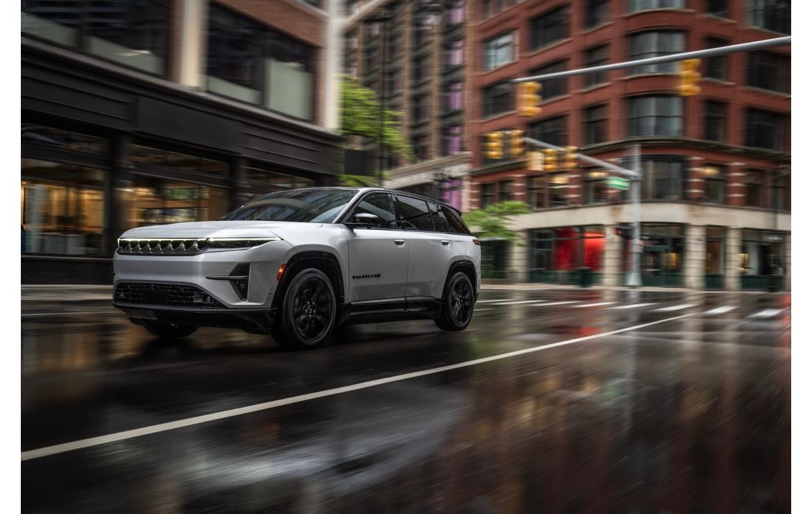 2024 Jeep Wagoneer S driving down city street.jpeg