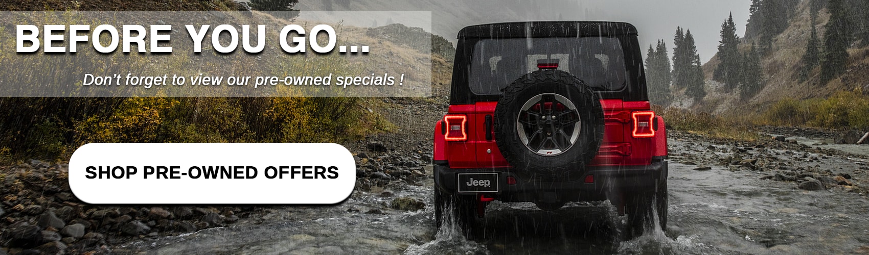 Shop Jeep Used Vehicle Specials Snowy hill road with Jeep Wrangler traveling up gravel-like terrain