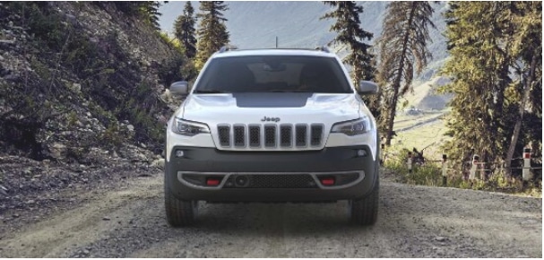 2019 Jeep Cherokee in White Facing Front Woods in Background