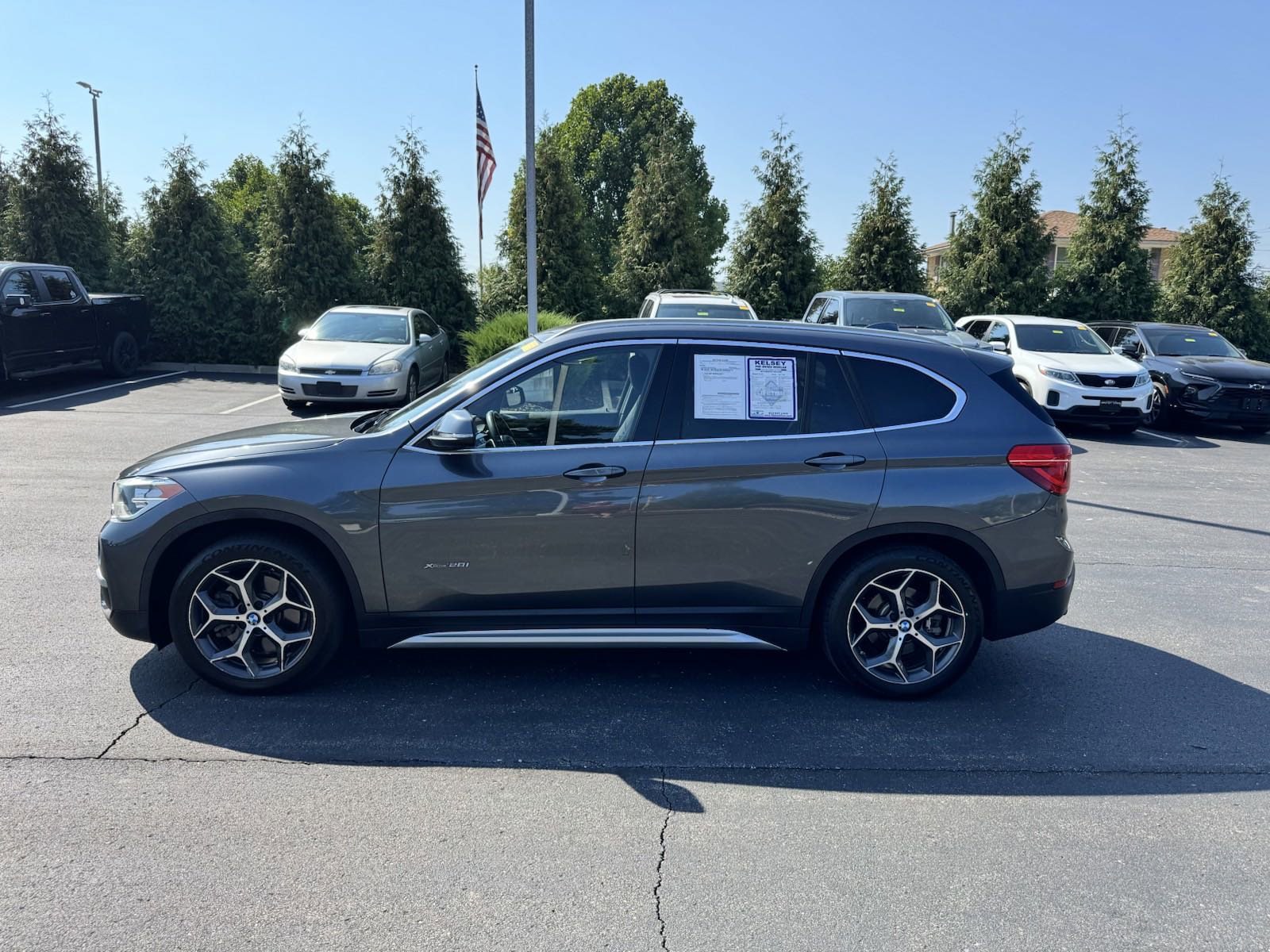 Used 2016 BMW X1 28i with VIN WBXHT3C36GP880384 for sale in Greendale, IN