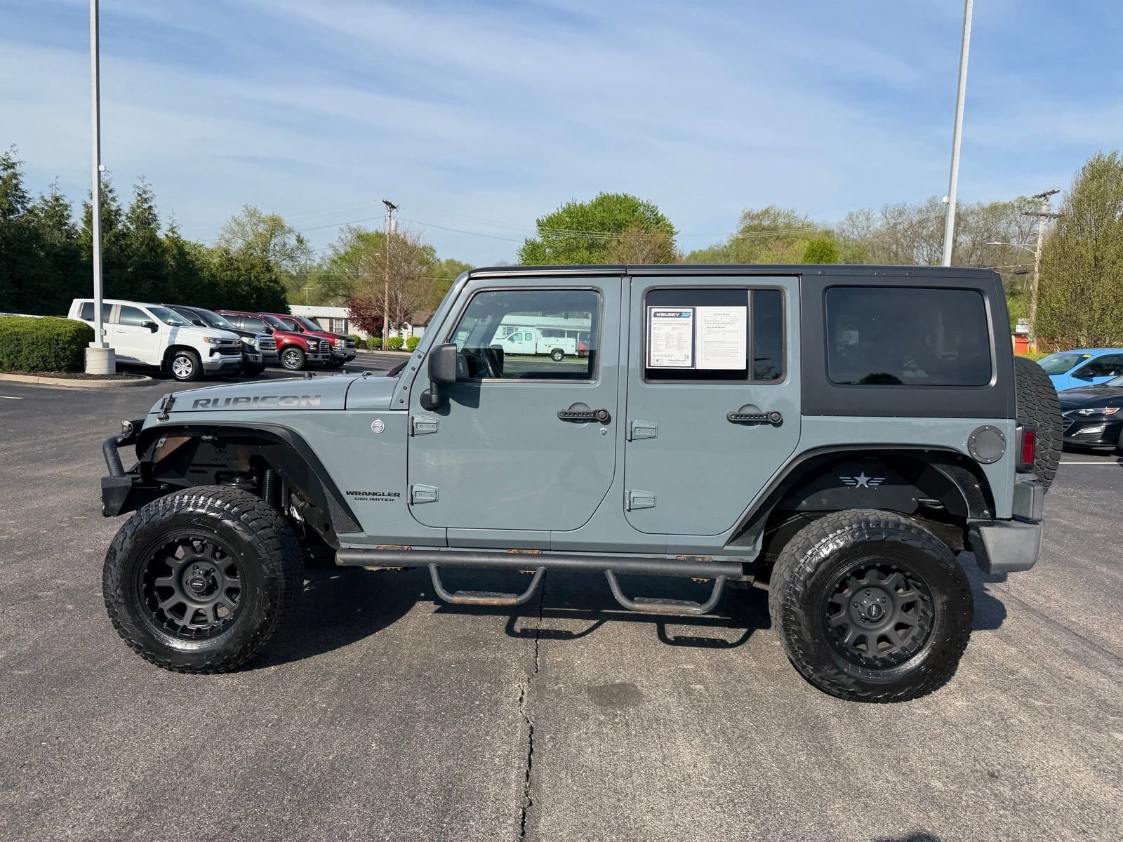 Used 2014 Jeep Wrangler Unlimited Rubicon with VIN 1C4HJWFG6EL178587 for sale in Greendale, IN