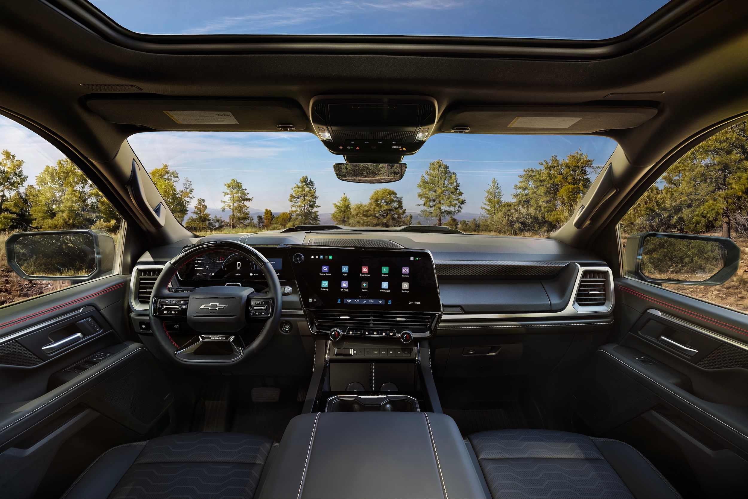 2027 Chevrolet Silverado 1500 and 2027 Ram 1500 interior and cargo comparison