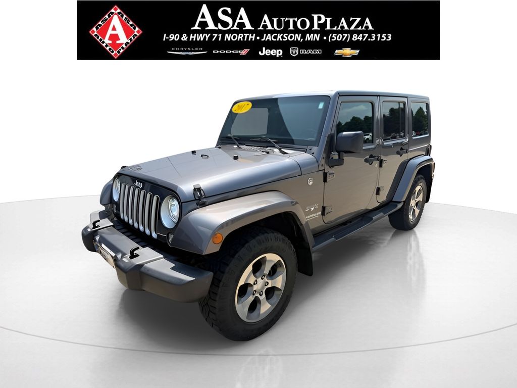 Used 2017 Jeep Wrangler Unlimited Sahara with VIN 1C4BJWEG8HL610835 for sale in Jackson, Minnesota