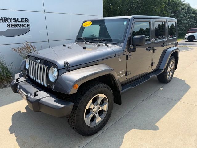 Used 2017 Jeep Wrangler Unlimited Sahara with VIN 1C4BJWEG8HL610835 for sale in Jackson, Minnesota