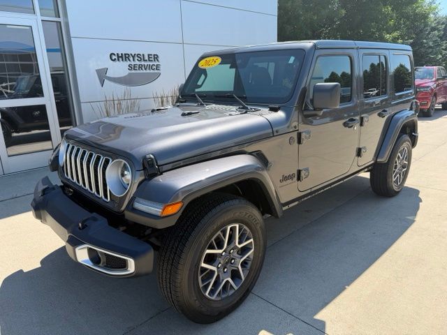 Used 2025 Jeep Wrangler 4-Door Sahara with VIN 1C4PJXEN3SW560328 for sale in Jackson, Minnesota