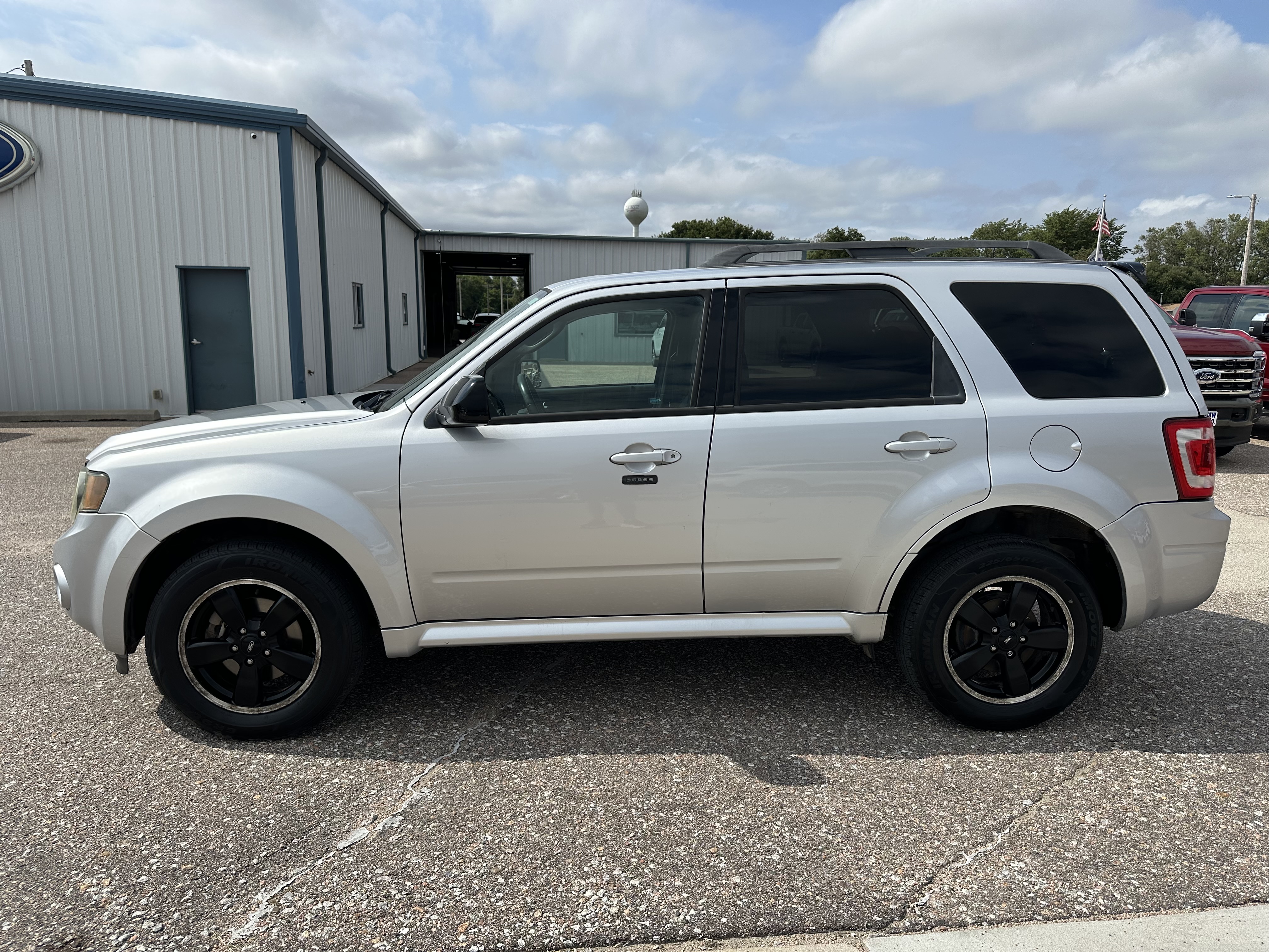 Used 2010 Ford Escape XLT with VIN 1FMCU0D76AKD23530 for sale in Kenesaw, NE