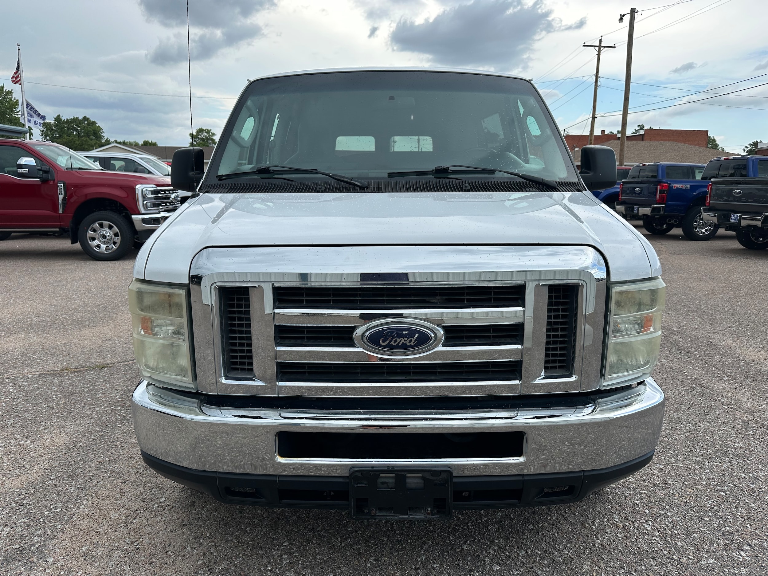 Used 2010 Ford E-Series Econoline Wagon XLT with VIN 1FBNE3BL0ADA55160 for sale in Kenesaw, NE