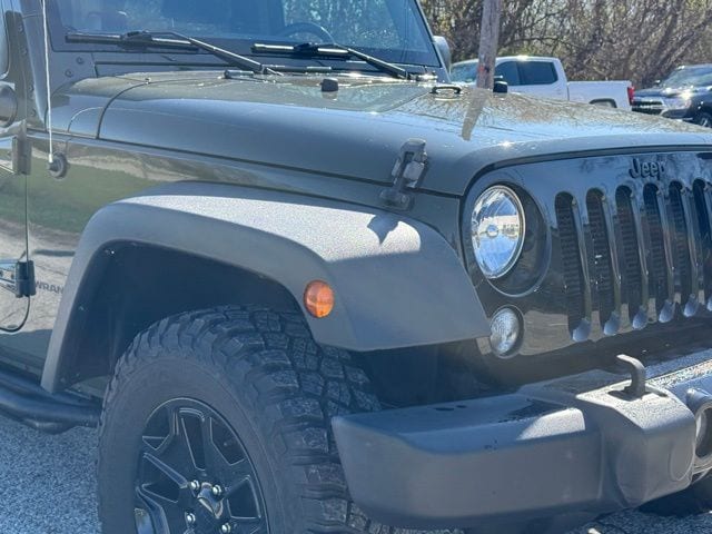 Used 2016 Jeep Wrangler Sport with VIN 1C4GJWAG5GL147272 for sale in Norwalk, OH