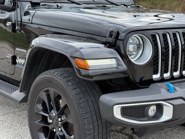 Used 2023 Jeep Wrangler 4xe Sahara 4XE with VIN 1C4JJXP64PW528720 for sale in Norwalk, OH