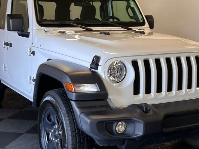 Used 2021 Jeep Wrangler Unlimited Sport with VIN 1C4HJXDGXMW861303 for sale in Norwalk, OH