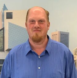 Staff member Joe Scott from ID_1321679589d1