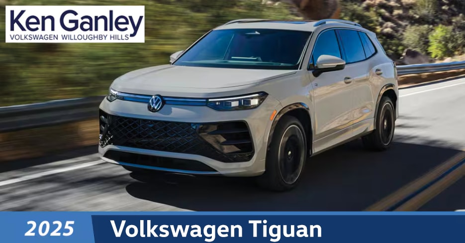  Person cheerfully signing documents.