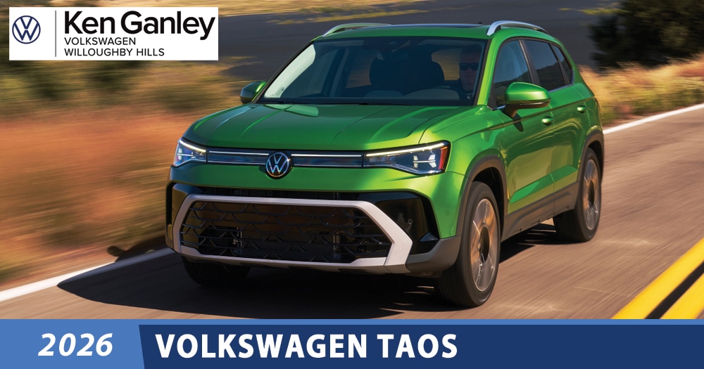  Person cheerfully signing documents.