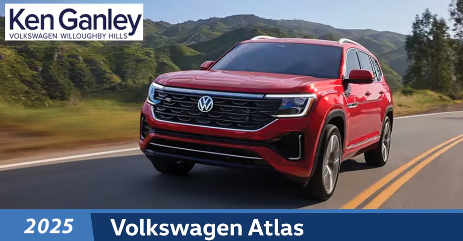  Person cheerfully signing documents.