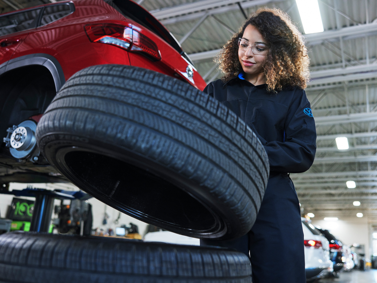 Volskwagen Service Staff choosing a wheel