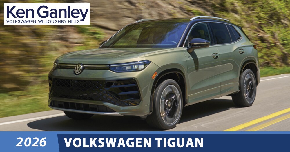  Person cheerfully signing documents.