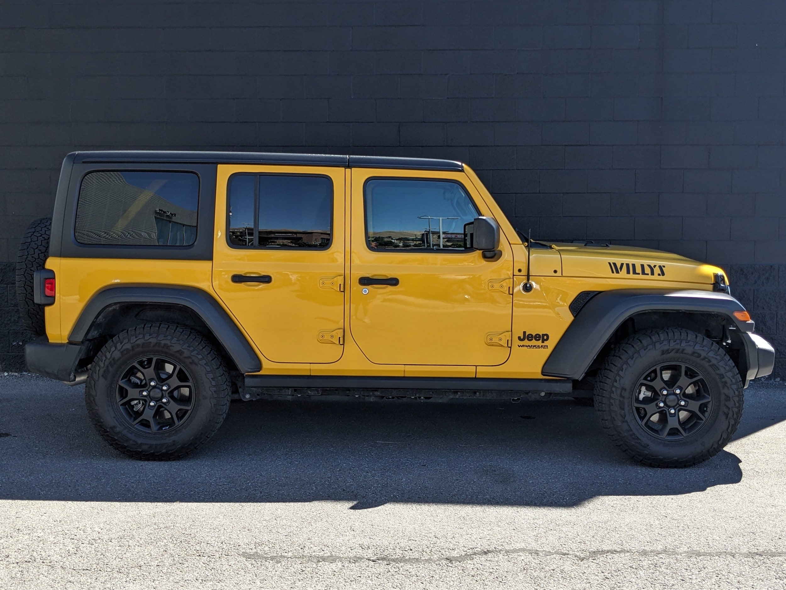 Used 2020 Jeep Wrangler Unlimited Willys with VIN 1C4HJXDG8LW215143 for sale in Lehi, UT