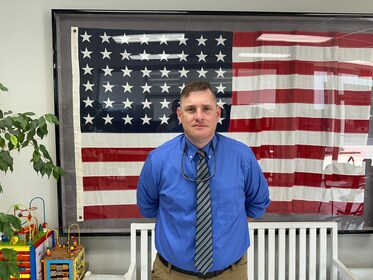 Staff member James Gatlin from cc1011a5f8dc