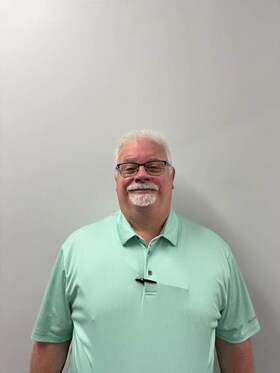 Staff member John Crane from b347dd703c0b