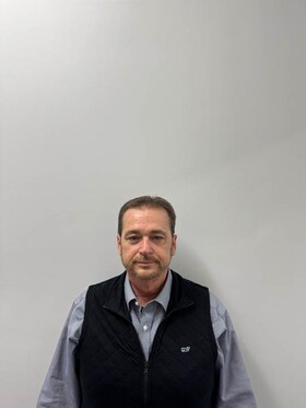 Staff member Danny Keith from 5db037c8ef44