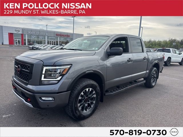 Gray (Gun Metallic) 2024 Nissan Titan PRO-4X Crew Cab 4WD Pickup Truck Four-Wheel Drive 9-Speed Automatic